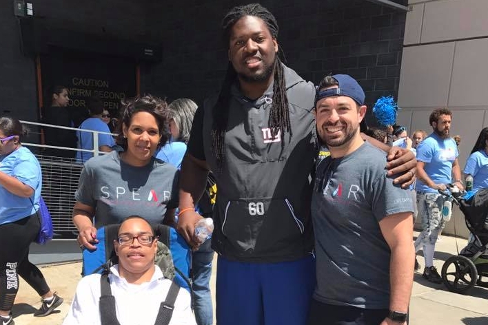 At the Autism Speaks Walk in New York City, SPEAR's team members happily volunteer to assist and raise money for the community