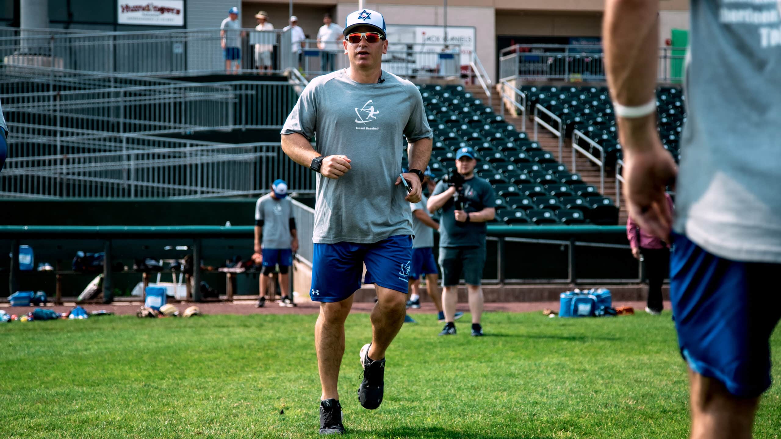 man running on a baseball field