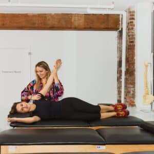 therapist physical therapy on a woman