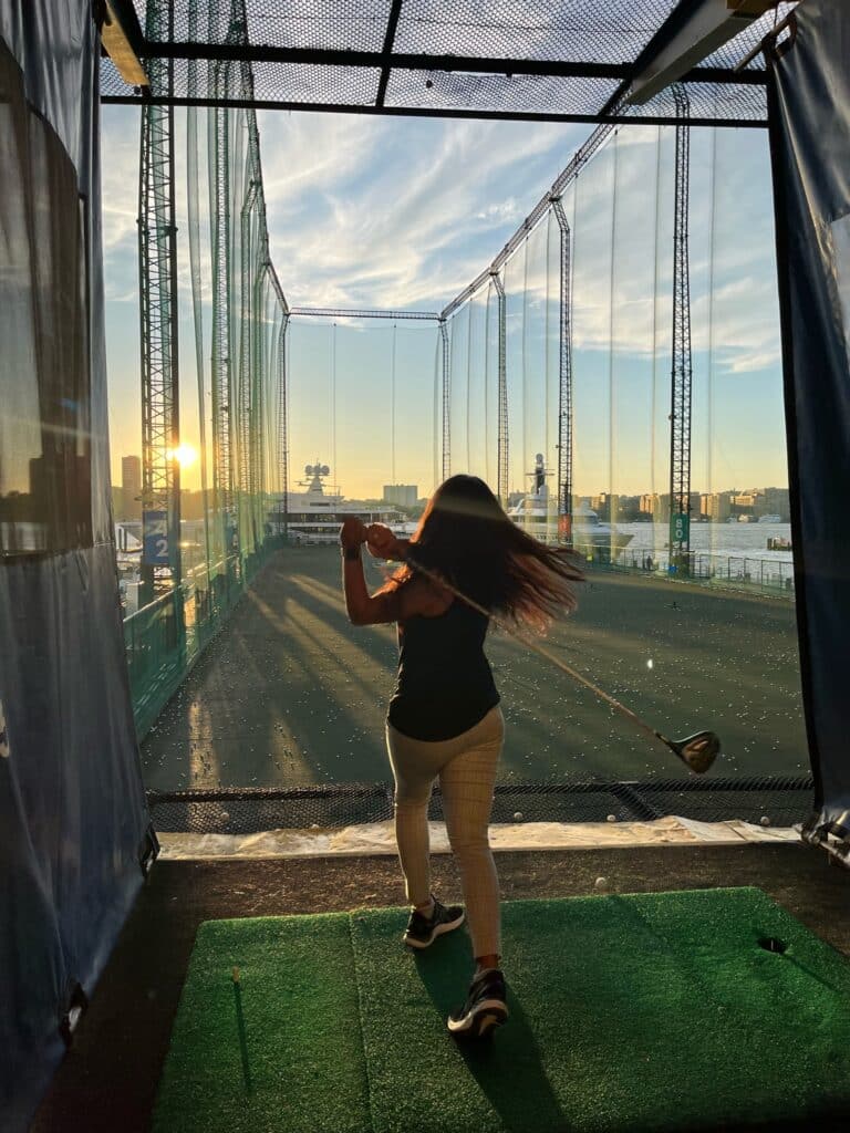 Jinal playing top golf