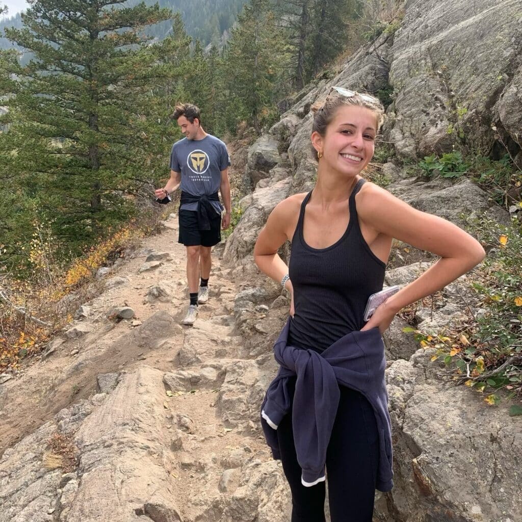 Jordan Witt hiking a mountain