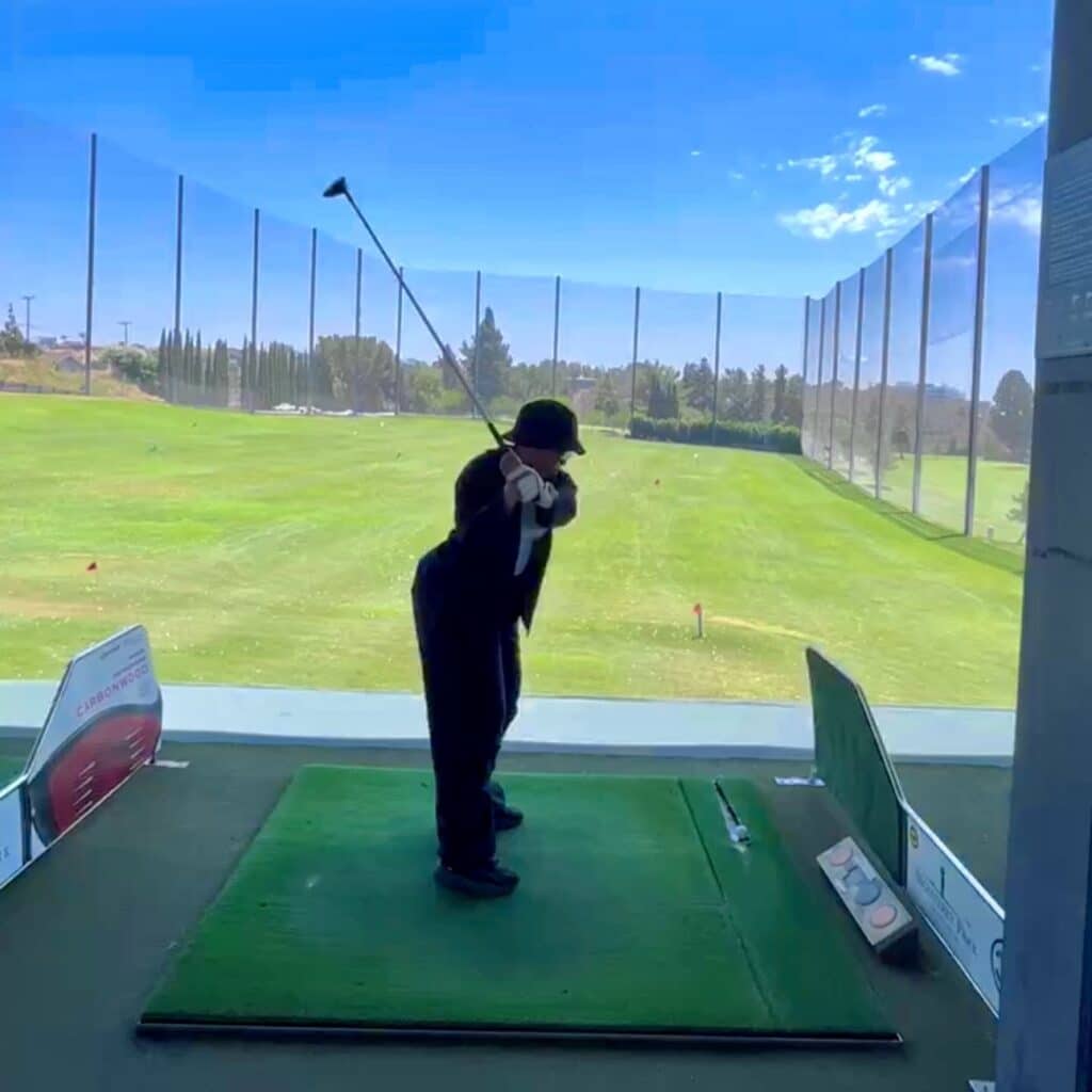 Adrianna Baker at a driving range