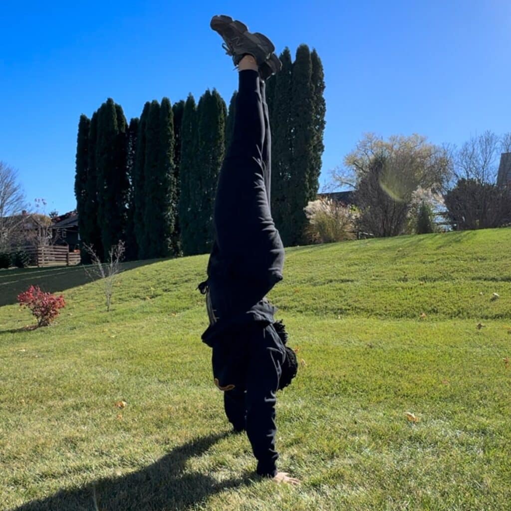 Adrianna Baker doing a handstand