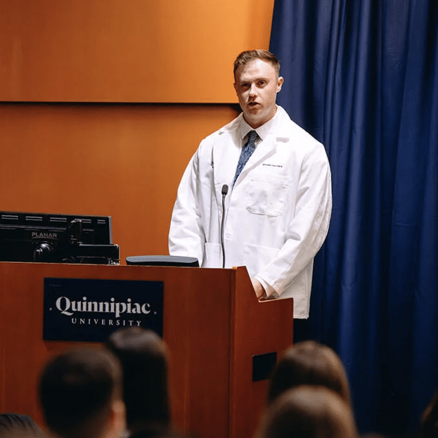 Michael Lacovara giving a speech at Quinnipiac