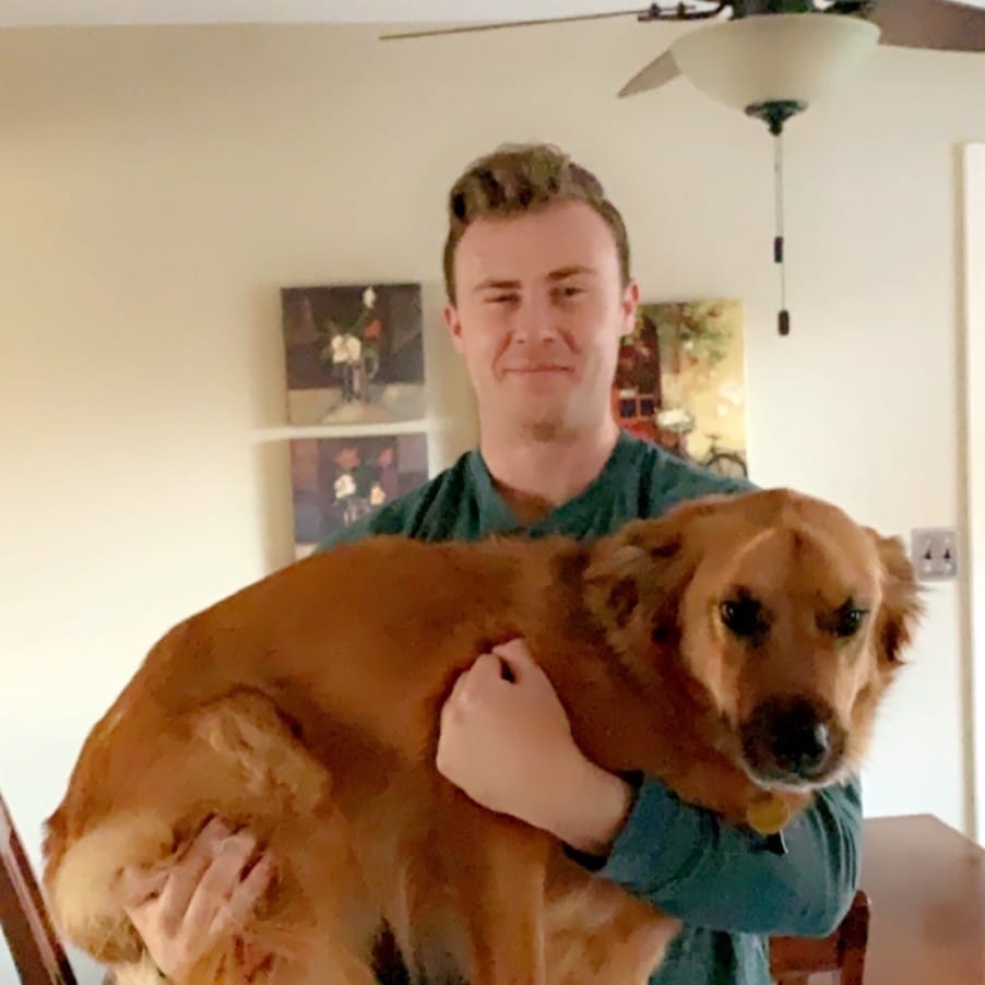 Michael Lacovara holding a dog