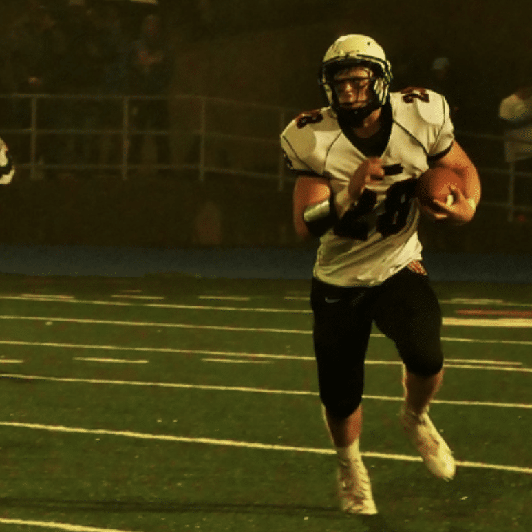 Michael Lacovara playing football